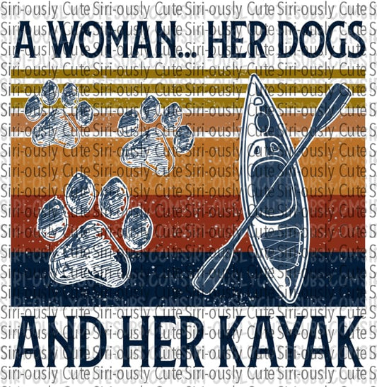 A Woman Her Dogs And Kayak